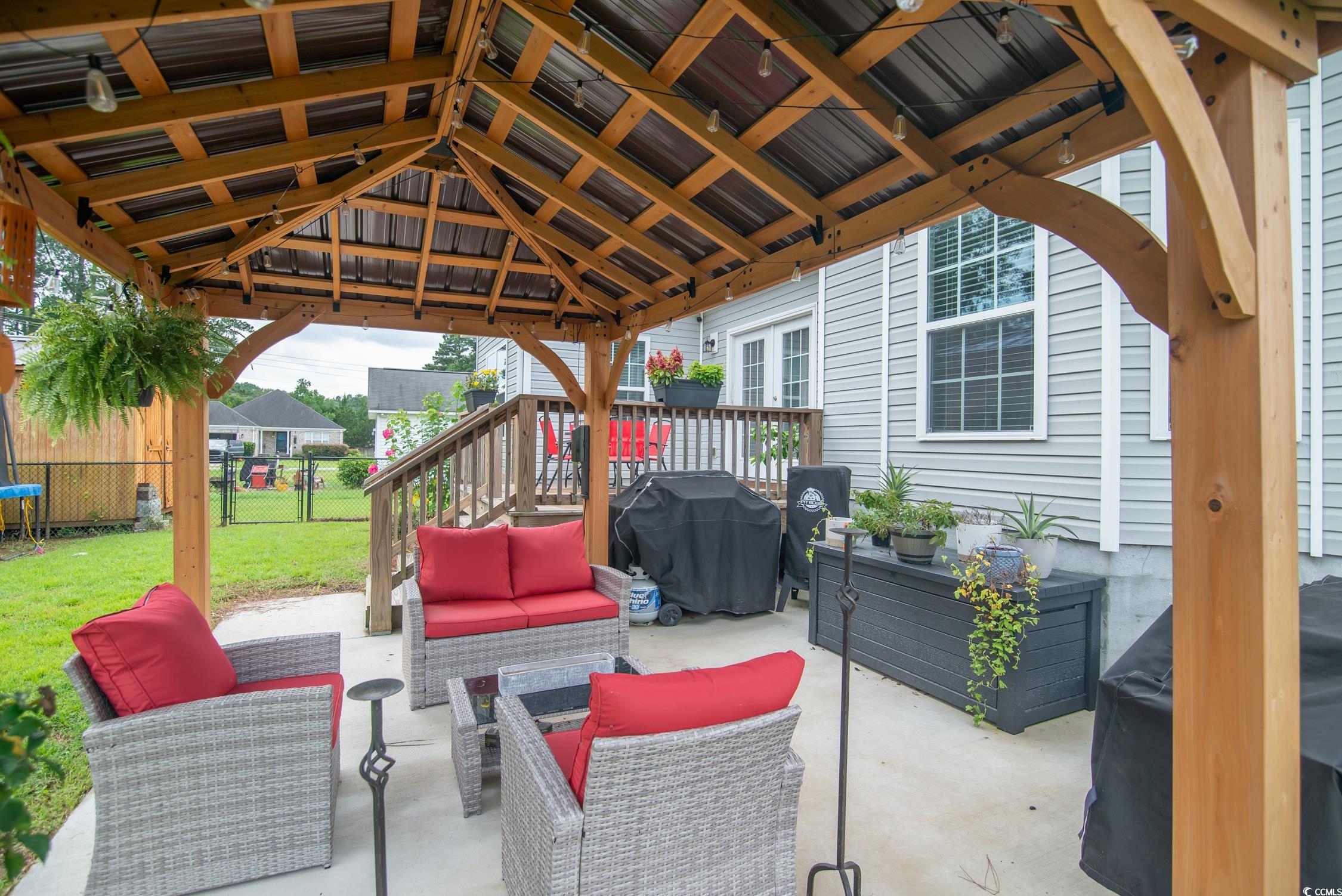 2242 Brier Street Georgetown, SC 29440 - Photo 22 of 29 View of patio with an outdoor living space, a gril