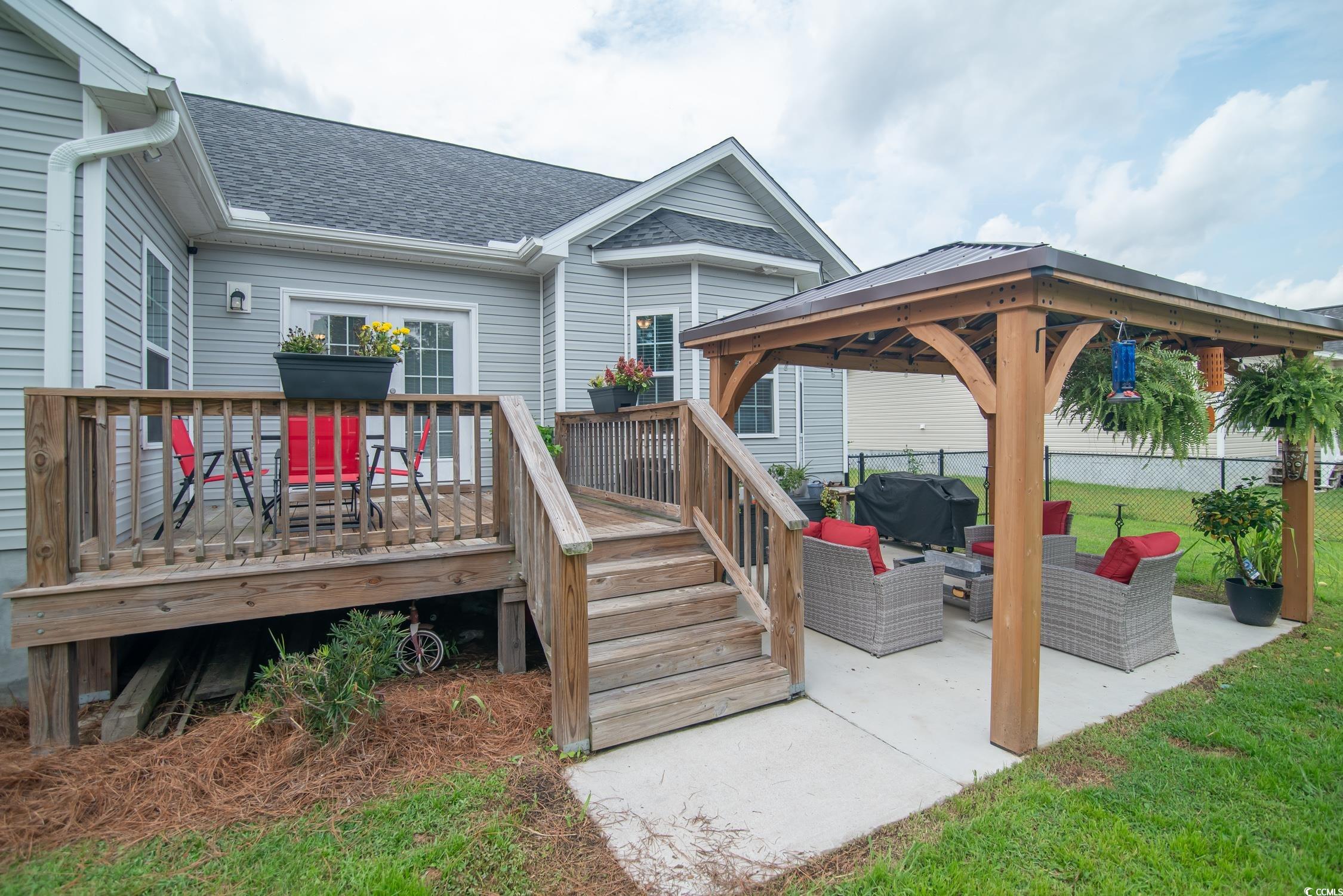 2242 Brier Street Georgetown, SC 29440 - Photo 23 of 29 Rear view of property featuring a gazebo, outdoor