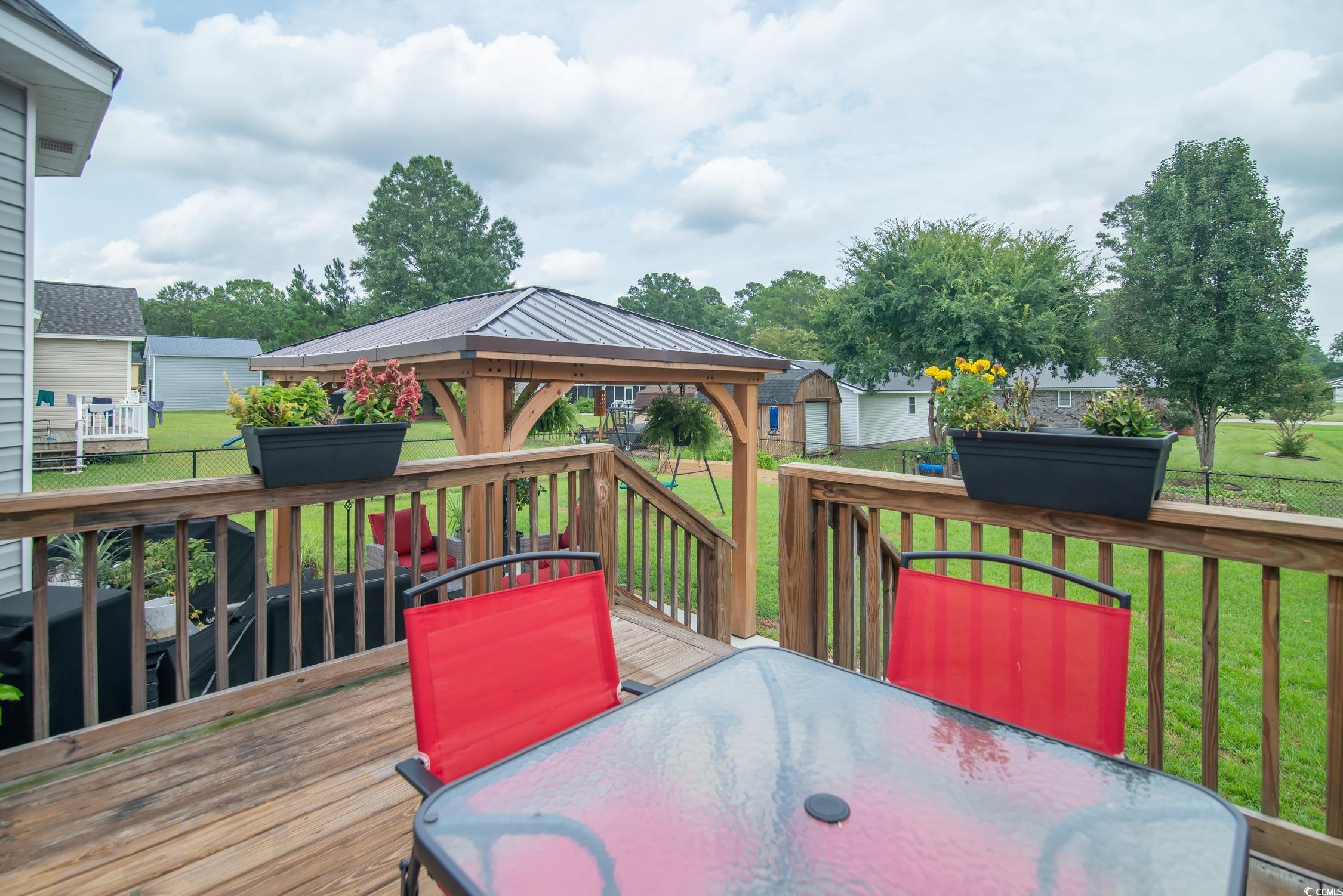 2242 Brier Street Georgetown, SC 29440 - Photo 25 of 29 Wooden terrace with a gazebo and a yard