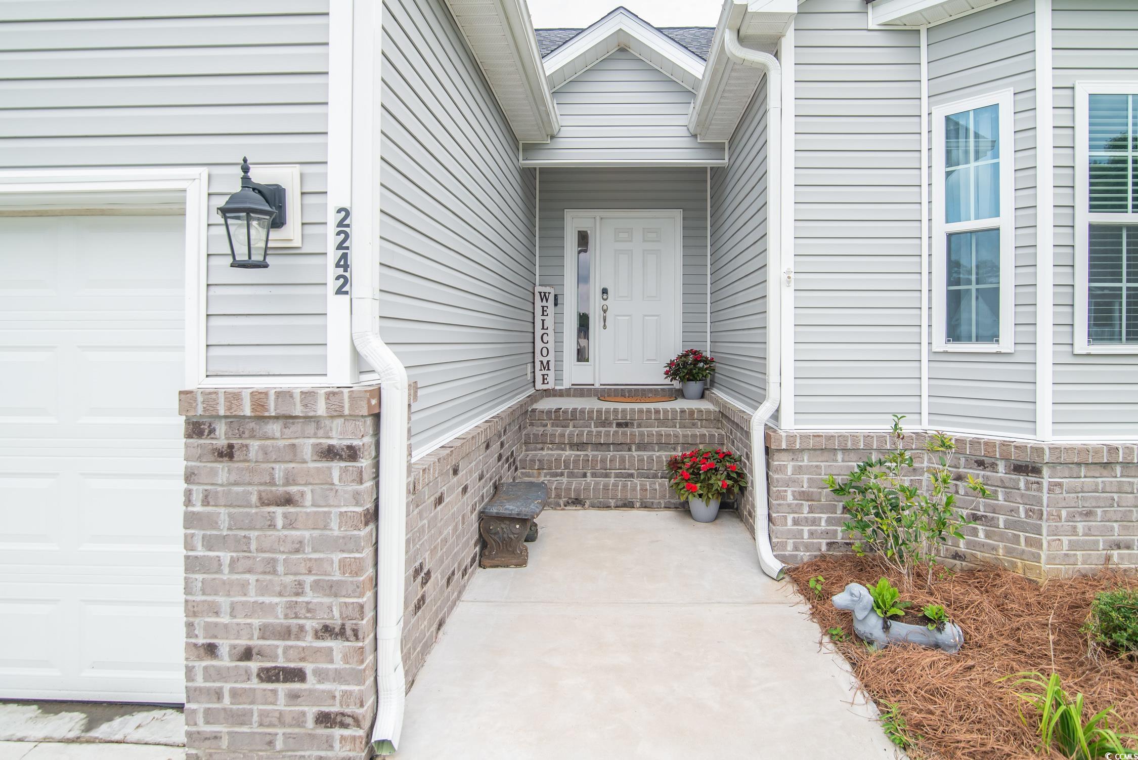 2242 Brier Street Georgetown, SC 29440 - Photo 3 of 29 Doorway to property featuring a garage