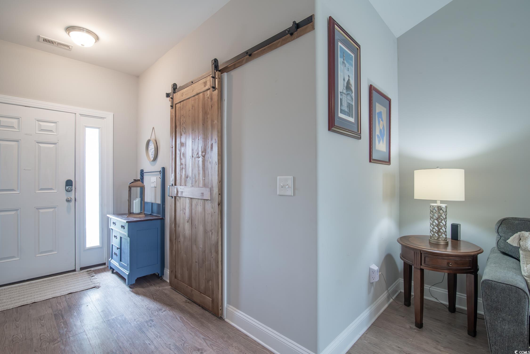 2242 Brier Street Georgetown, SC 29440 - Photo 4 of 29 Foyer entrance featuring wood-type flooring and a