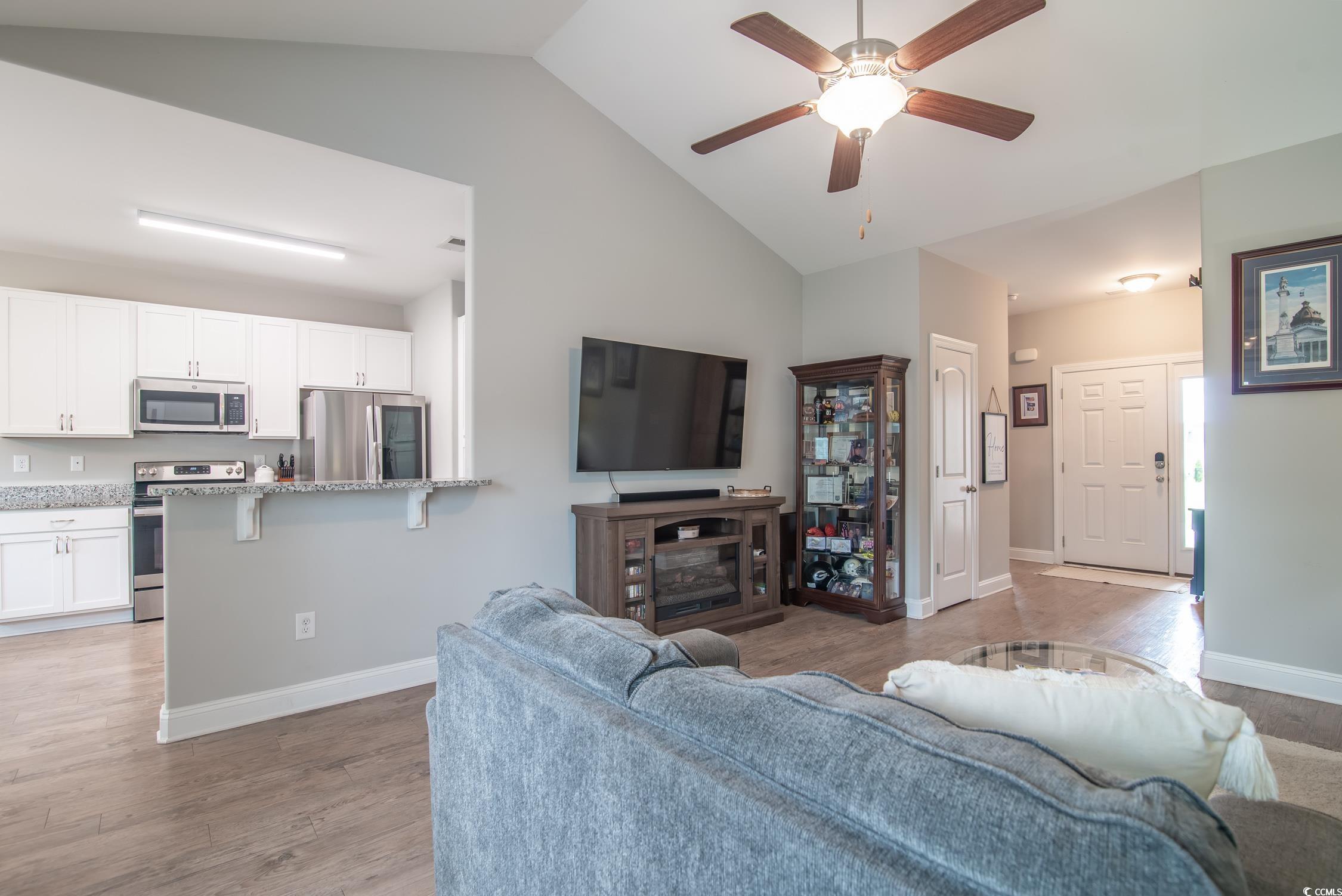 2242 Brier Street Georgetown, SC 29440 - Photo 6 of 29 Living room featuring vaulted ceiling, ceiling fan