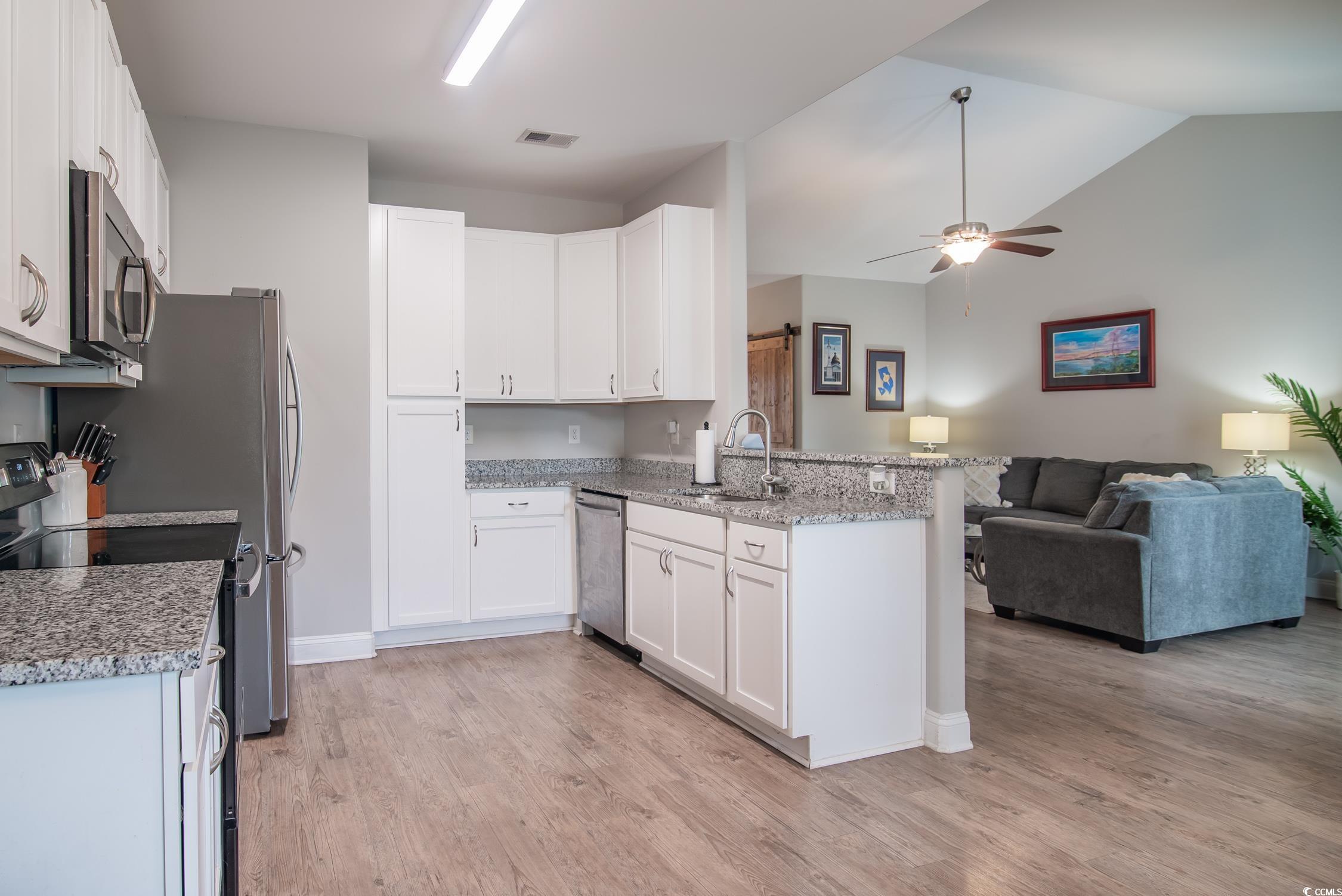 2242 Brier Street Georgetown, SC 29440 - Photo 8 of 29 Kitchen with light hardwood / wood-style flooring,