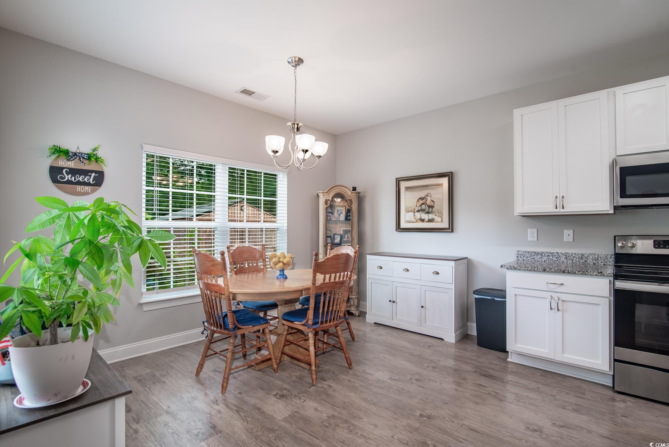 2242 Brier Street Georgetown, SC 29440 - Photo 9 of 29 Dining room featuring light hardwood / wood-style
