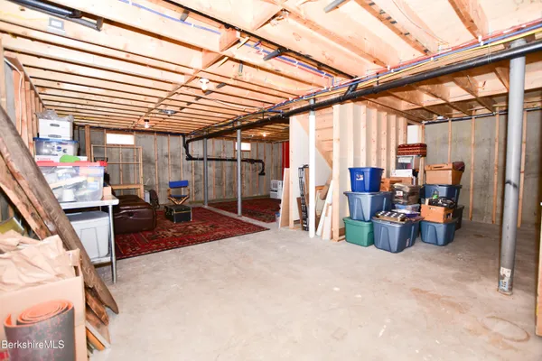 a kitchen with a refrigerator stove and microwave
