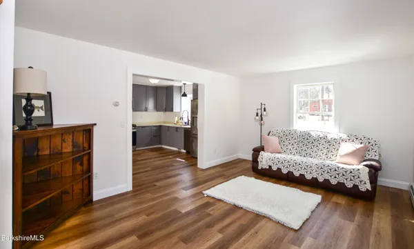 a room with a bed and a window