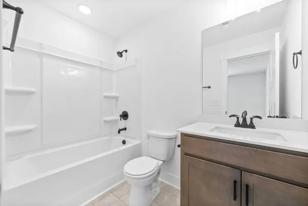 a view of yard with large trees