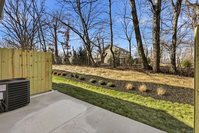 a view of balcony with wooden floor and stairs