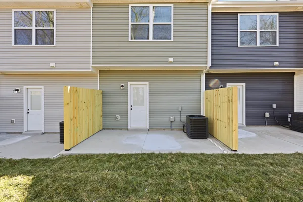 a view of balcony with wooden floor and stairs
