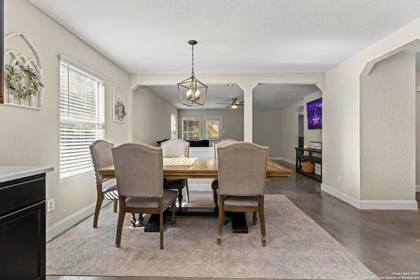 a view of a dining room with furniture