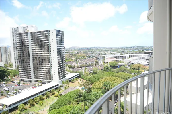 a view of a city skyline from a balcony
