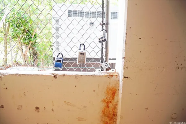 a close up of a wall with a sink