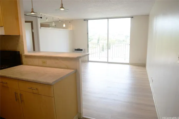 a bathroom with a sink a vanity and a large mirror
