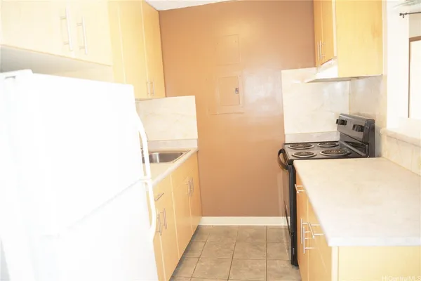 a bedroom with a bed and a cabinets