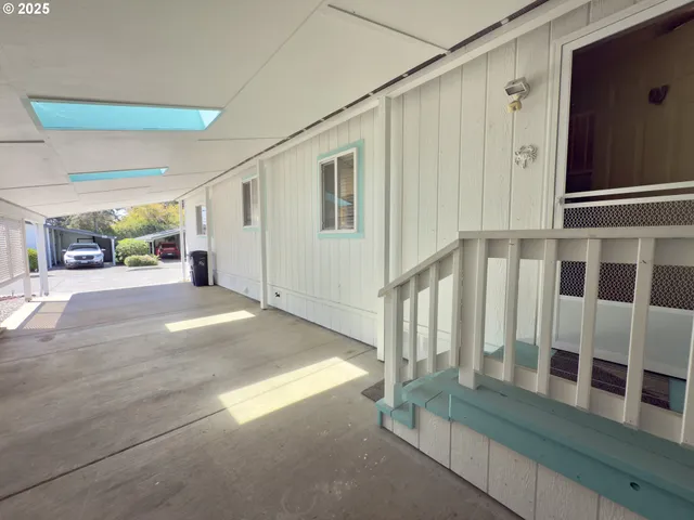 a view of an entrance with stairs