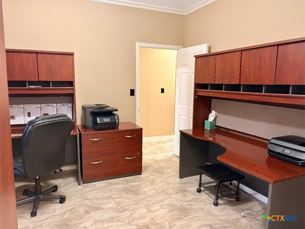 116 Northampton Circle Victoria, TX 77904 - Photo 11 of 13 a workspace with furniture and wooden floor