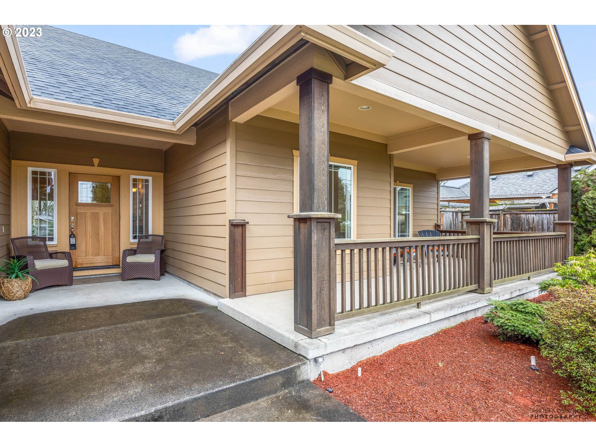 84 Federal Lane Eugene, OR 97404 - Photo 3 of 32 a view of a house with porch and furniture