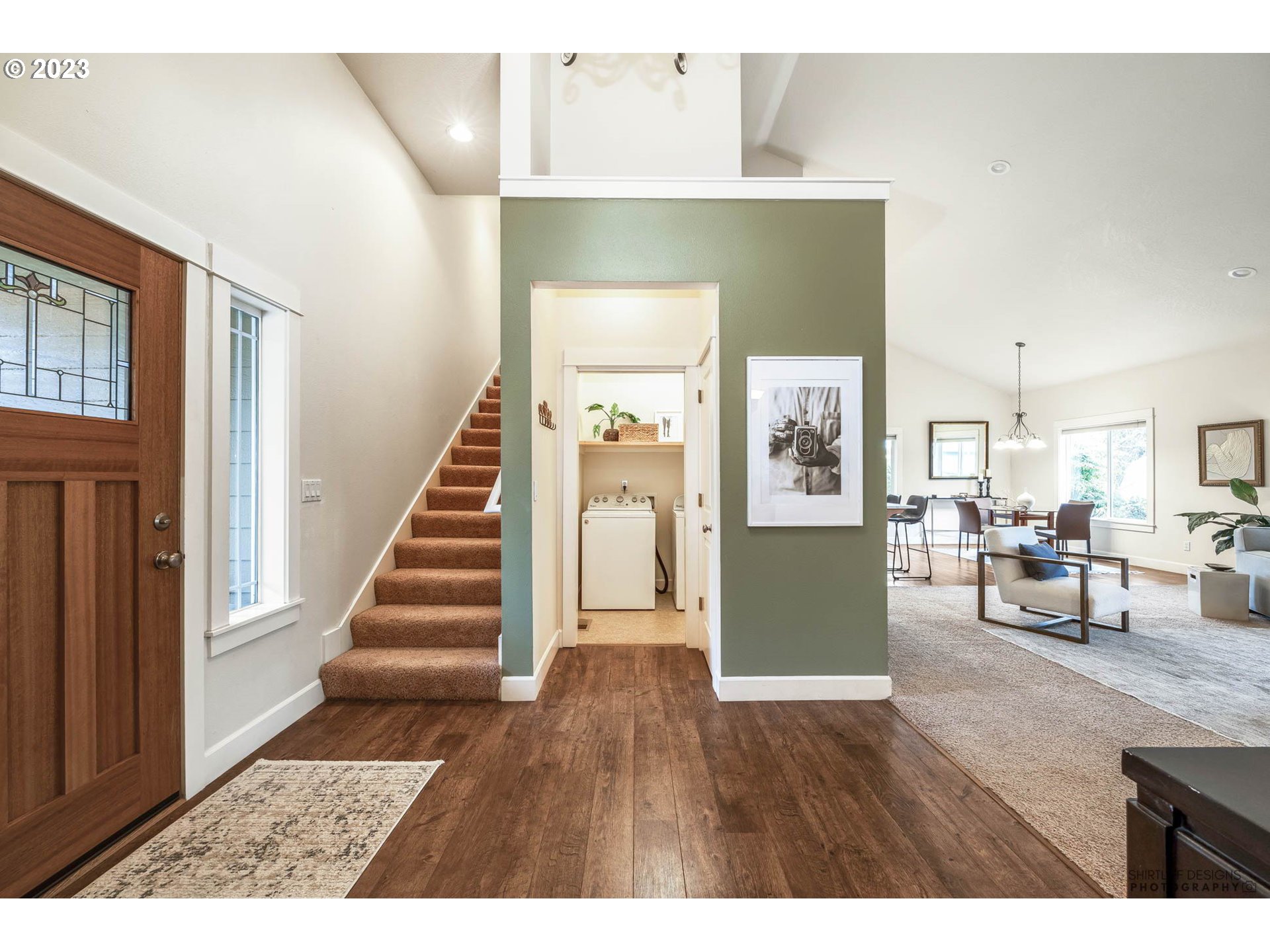 84 Federal Lane Eugene, OR 97404 - Photo 5 of 32 a view of an entryway and livingroom with furniture