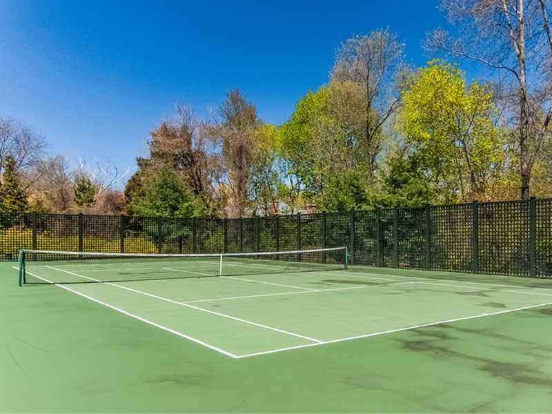 38 Hunting Ridge Lane Wilton, CT 06897 - Photo 17 of 25 a view of a tennis court