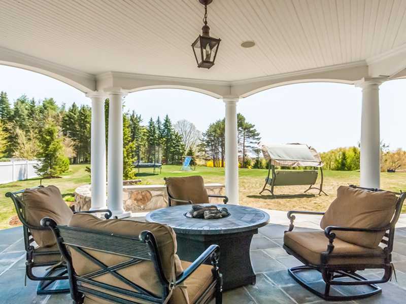 38 Hunting Ridge Lane Wilton, CT 06897 - Photo 19 of 25 a view of a livingroom with furniture and floor to ceiling window