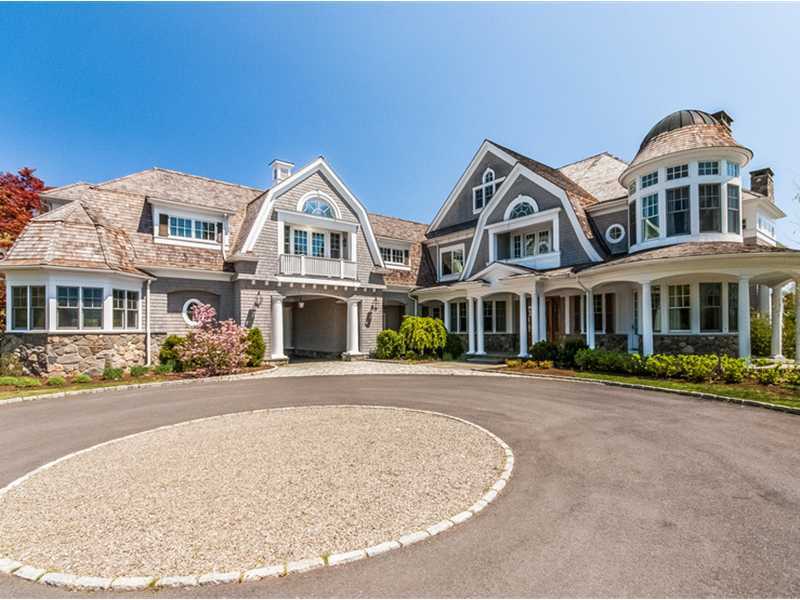 38 Hunting Ridge Lane Wilton, CT 06897 - Photo 3 of 25 front view of a house with a yard