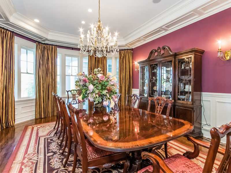 38 Hunting Ridge Lane Wilton, CT 06897 - Photo 6 of 25 a dining room with furniture a chandelier and wooden floor