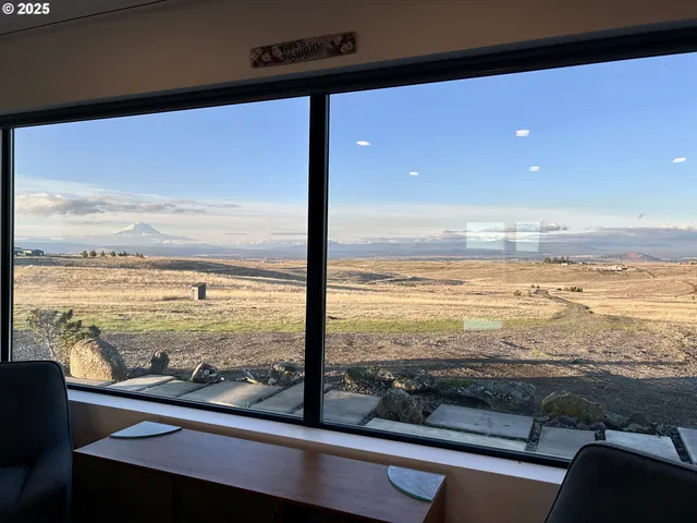 a view of a house with a ocean view