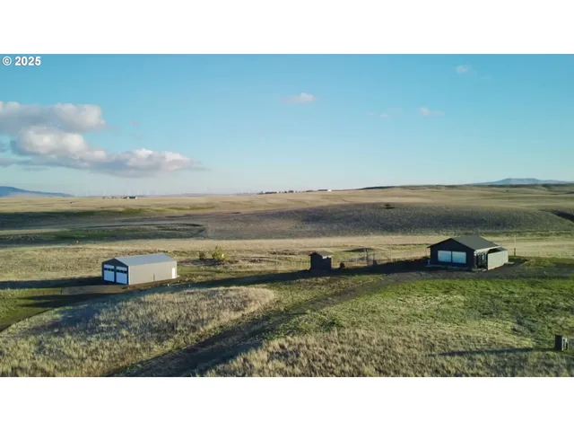 a view of a city and ocean from a balcony
