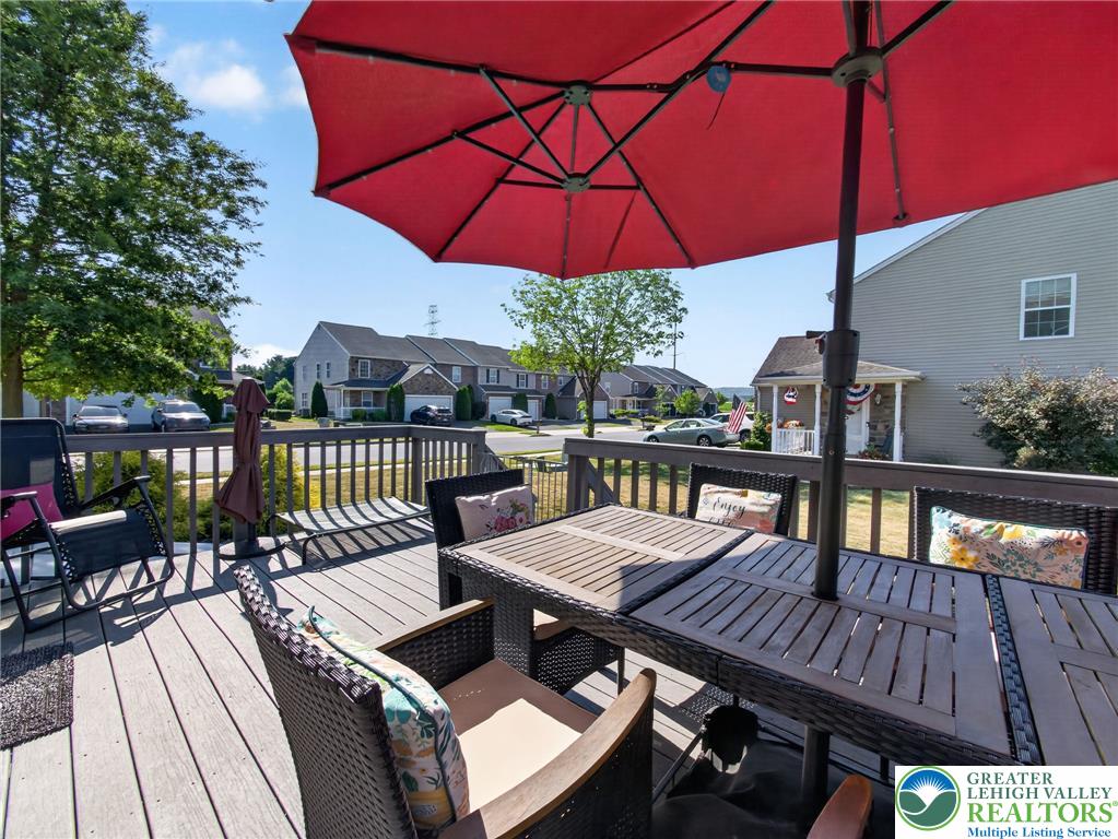 4148 Ross Road Bethlehem, PA 18020 - Photo 13 of 67 A spacious outdoor deck provides an ideal setting for relaxation and entertainment.