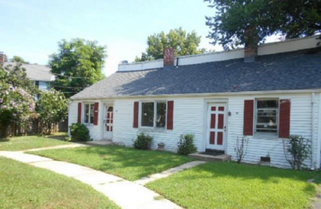 91 High Ridge Drive Bridgeport, CT 06606 - Photo 1 of 1 front view of a house with a yard