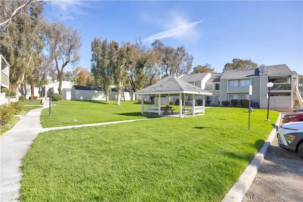 a view of a house with a big yard