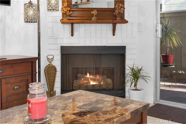 a room with fireplace and wooden floor
