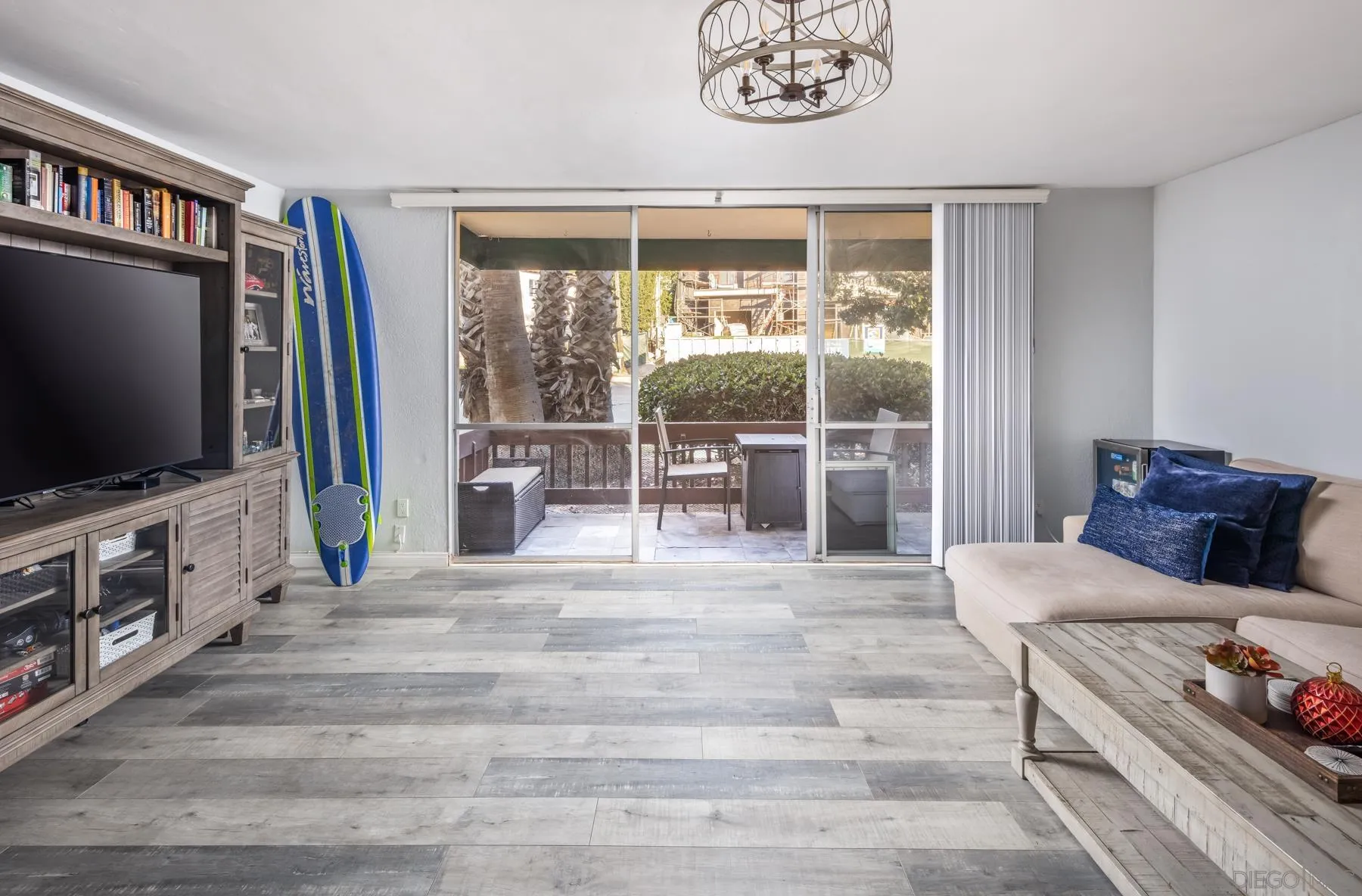 6333 La Jolla Boulevard, Unit 170 La Jolla, CA 92037 - Photo 6 of 18 a living room with furniture and a flat screen tv