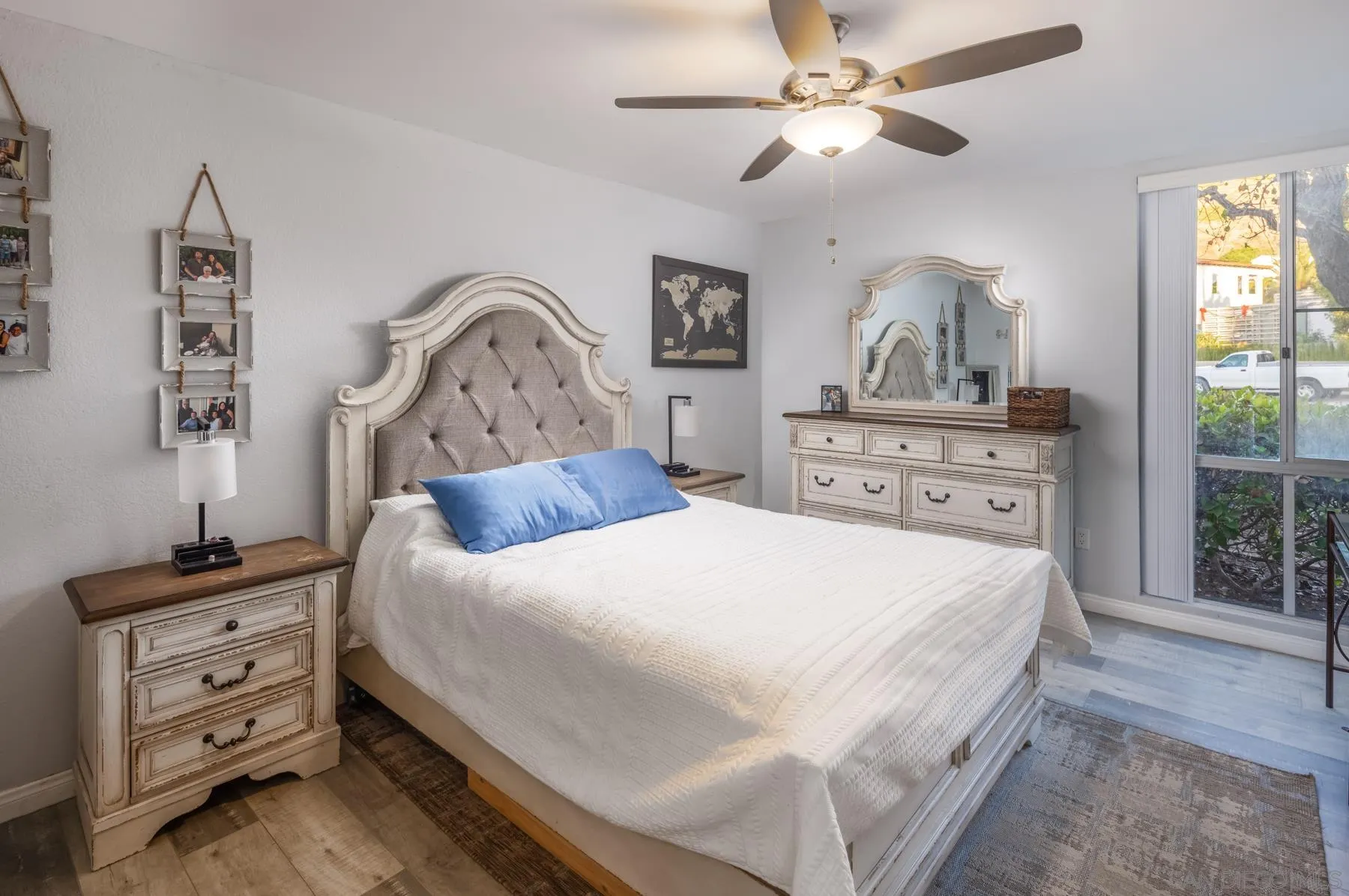 6333 La Jolla Boulevard, Unit 170 La Jolla, CA 92037 - Photo 7 of 18 a bedroom with a bed and a dresser