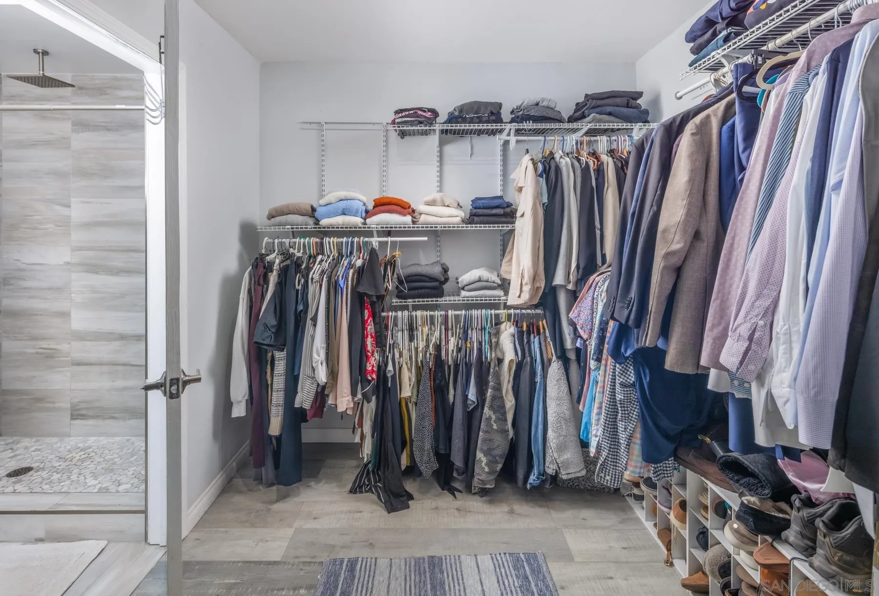 6333 La Jolla Boulevard, Unit 170 La Jolla, CA 92037 - Photo 10 of 18 a view of walk in closet with clothes