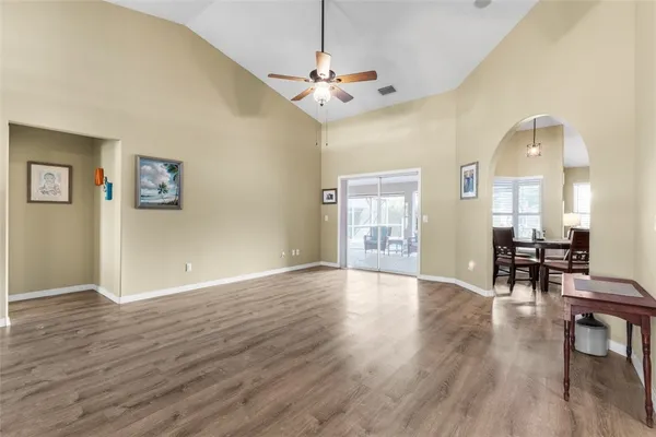 a view of a livingroom with furniture and wooden floor