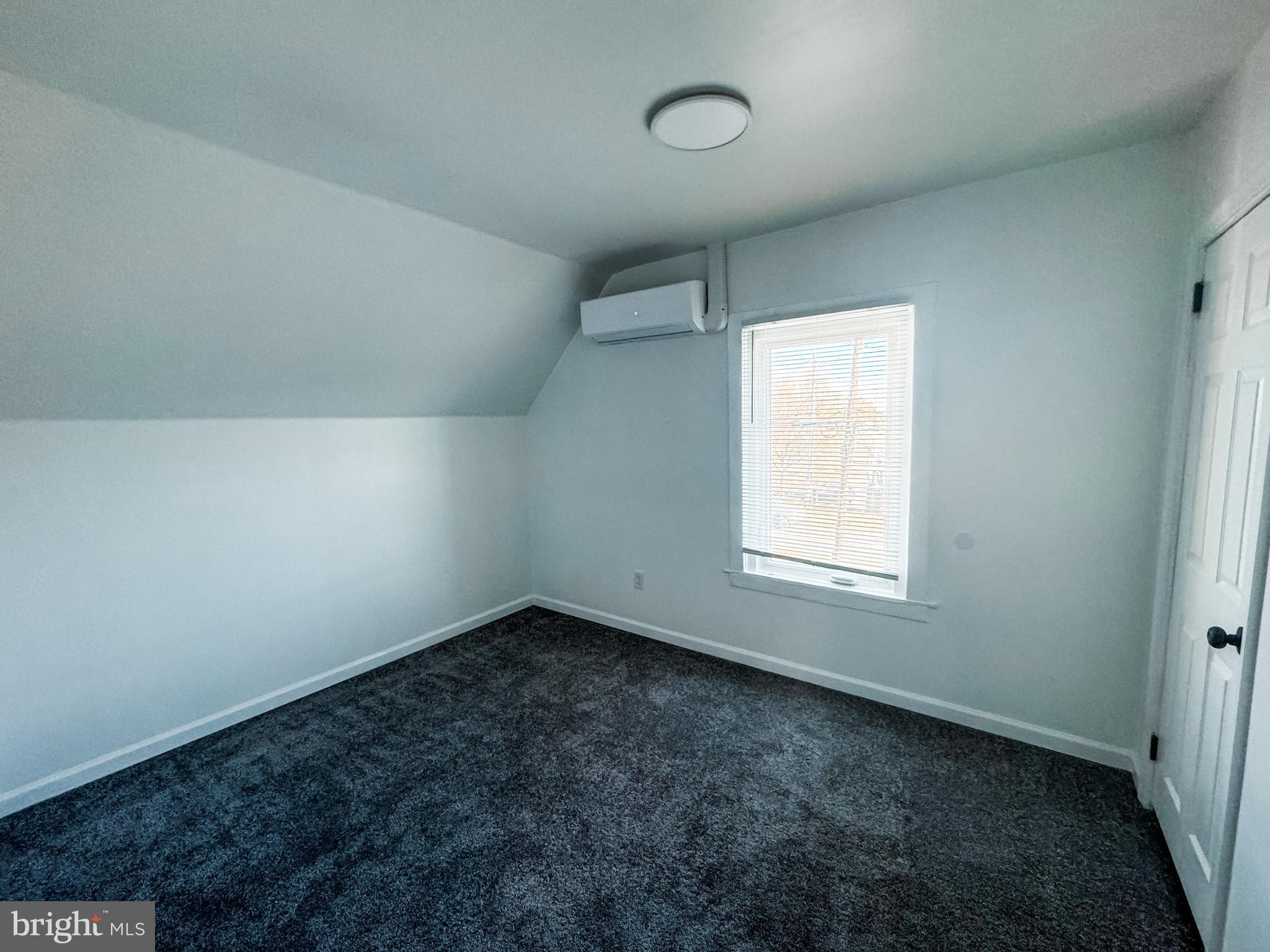 217 Ridge Road Claymont, DE 19703 - Photo 15 of 18 an empty room with a window