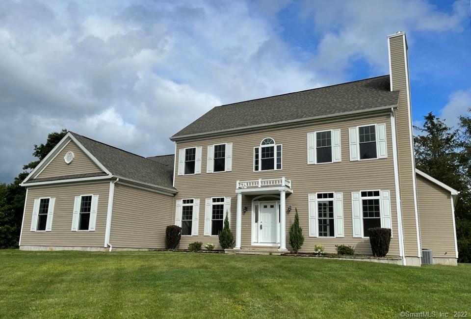 1 Golden Heights Road Danbury, CT 06811 - Photo 1 of 1 a front view of a house with a yard