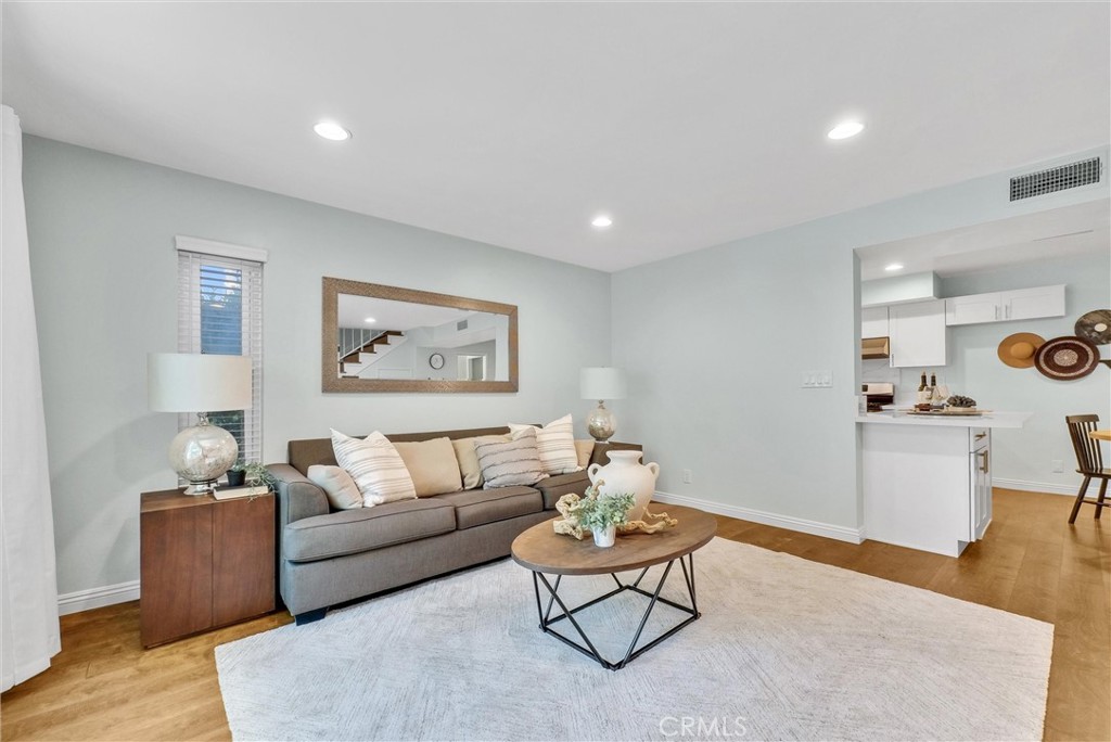 1528 North Gilbert Street Fullerton, CA 92833 - Photo 11 of 40 a living room with furniture and wooden floor
