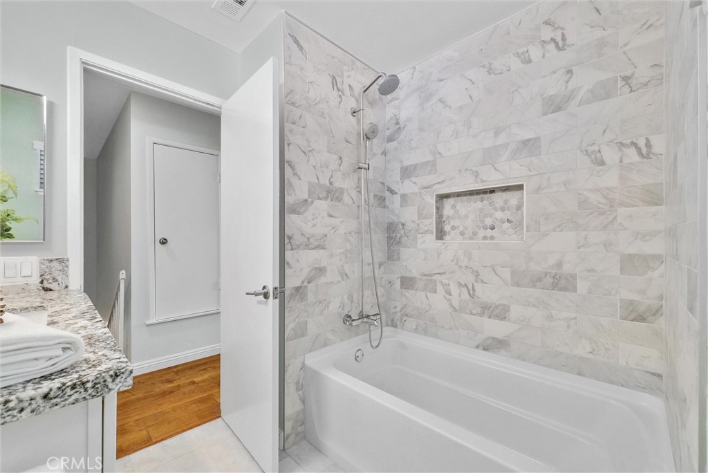 1528 North Gilbert Street Fullerton, CA 92833 - Photo 27 of 40 a bathroom with a bathtub and shower