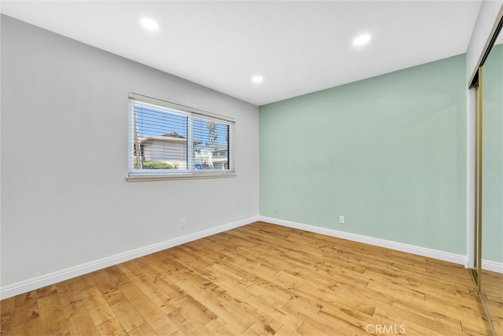 1528 North Gilbert Street Fullerton, CA 92833 - Photo 31 of 40 a view of empty room with wooden floor and fan