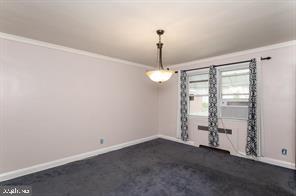 1618 Roundhill Road Baltimore, MD 21218 - Photo 9 of 50 a view of empty room with ceiling fan