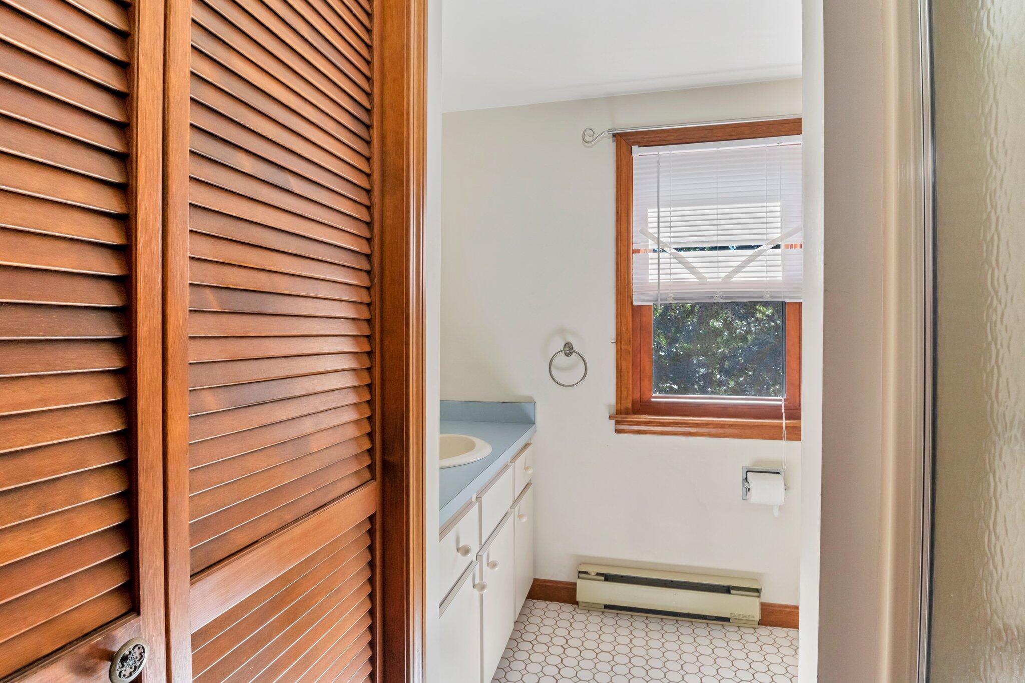 15 Chipmunk Lane Eastham, MA 02642 - Photo 20 of 32 a bathroom with a sink and a shower