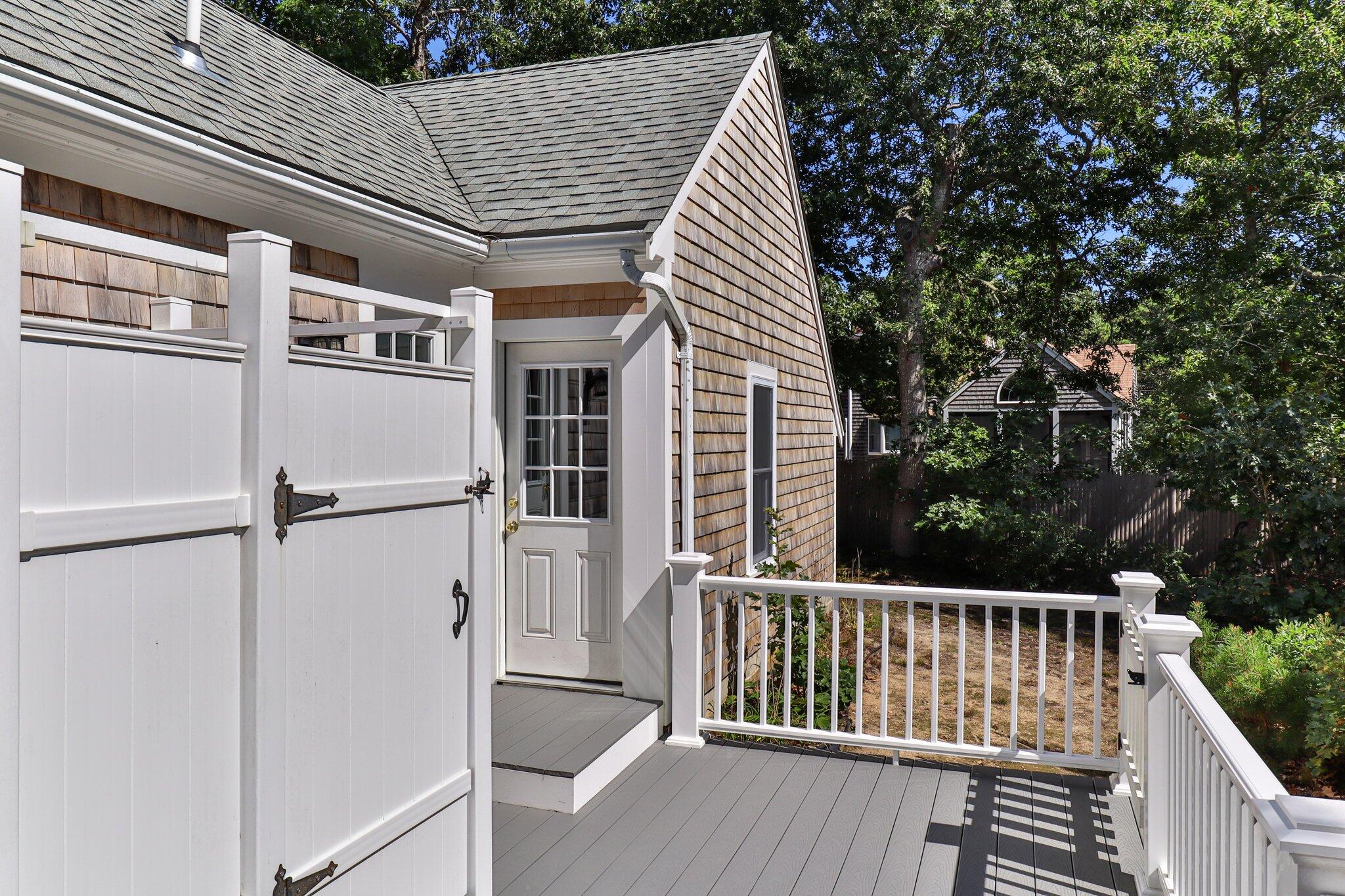 15 Chipmunk Lane Eastham, MA 02642 - Photo 24 of 32 a view of a balcony with wooden floor