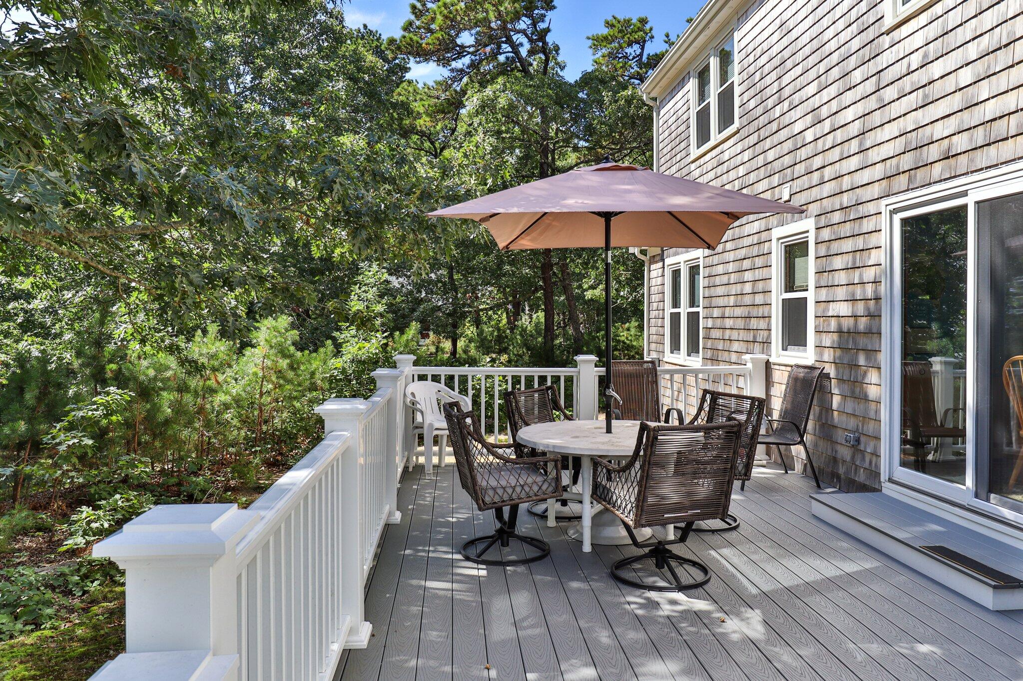 15 Chipmunk Lane Eastham, MA 02642 - Photo 26 of 32 a view of deck with furniture and barbeque oven