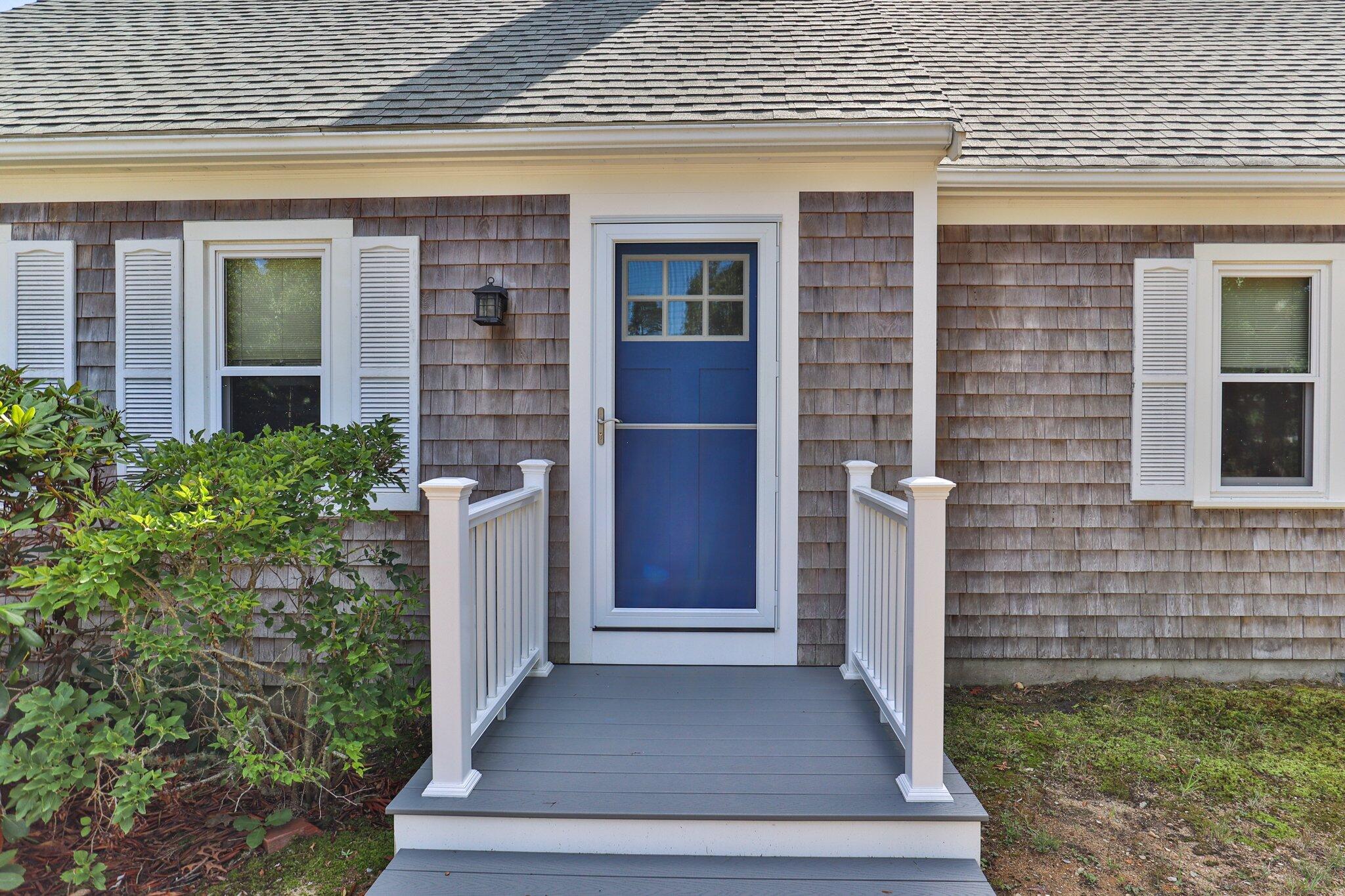 15 Chipmunk Lane Eastham, MA 02642 - Photo 3 of 32 a view of front door of house with stairs