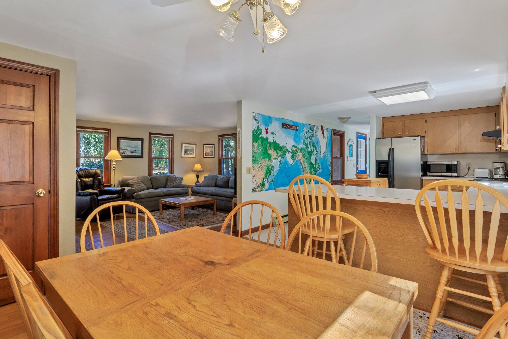 15 Chipmunk Lane Eastham, MA 02642 - Photo 7 of 32 a bedroom with two beds and a large window