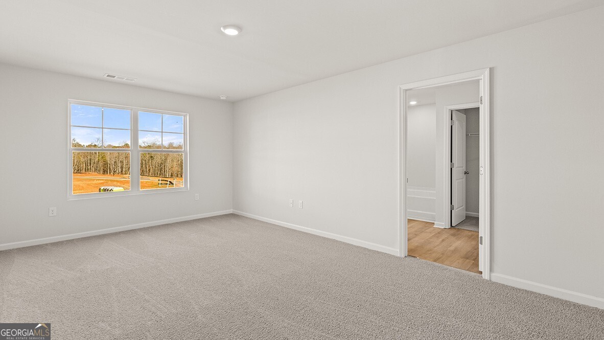 3253 Ryker Road, Unit 304 Gainesville, GA 30507 - Photo 16 of 32 an empty room with window