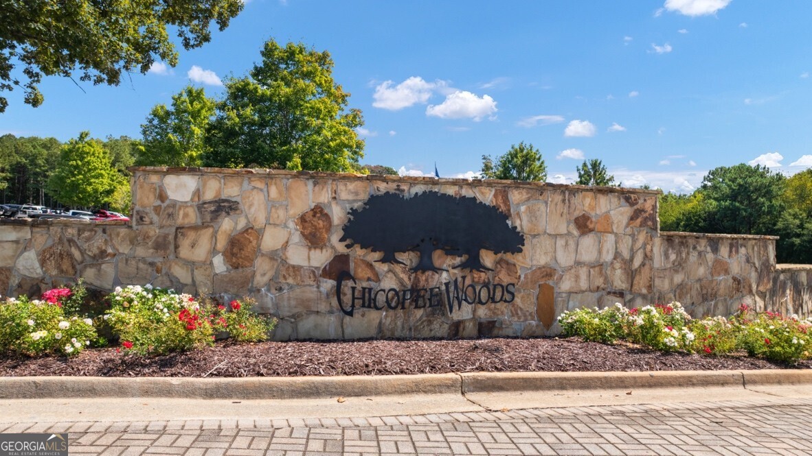 3253 Ryker Road, Unit 304 Gainesville, GA 30507 - Photo 29 of 32 a view of a street with a flower garden