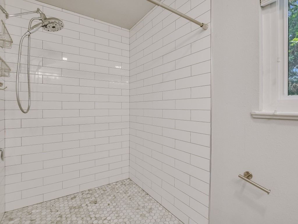 7617 Eastcrest Drive Austin, TX 78752 - Photo 14 of 20 a bathroom with a shower